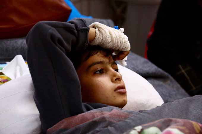 A child in one of the Erbil's Emergency Hospitals beds
