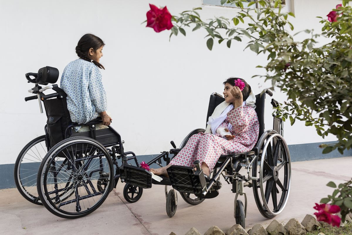 Walas Bibi and Zubaida playing in the garden